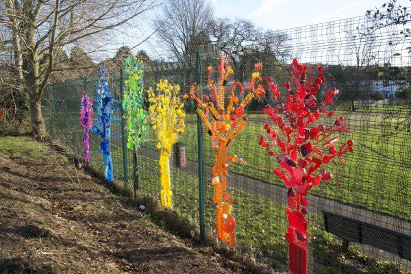 colorful tree installation by plastic bottles